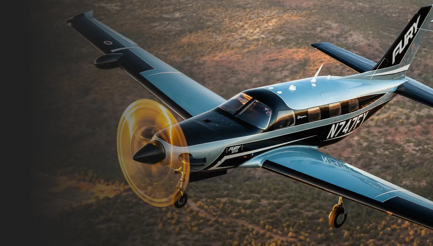 Piper M700 in flight